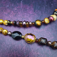This is Forest Fairy SIENNA, a jazz singer in the Darkenwald community of Adina. Sienna’s husky voice will hypnotize you. Listen for it in the warm breezes of a summer night.  FOREST FAIRIES are ONE OF A KIND Artisan Necklaces by Studio Navarri