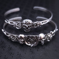 Embrace the unpredictable and add a touch of darkness to your fashion with our Goth Garden Cuffs. Lots of Skulls, Roses, Serpents and such. Let your spooky shine! By My Secret Heart Studios