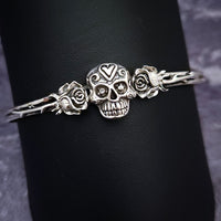 Embrace the unpredictable and add a touch of darkness to your fashion with our Goth Garden Cuffs. Lots of Skulls, Roses, Serpents and such. Let your spooky shine! By My Secret Heart Studios