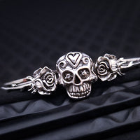 Embrace the unpredictable and add a touch of darkness to your fashion with our Goth Garden Cuffs. Lots of Skulls, Roses, Serpents and such. Let your spooky shine! By My Secret Heart Studios