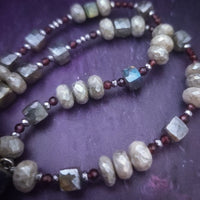 Rich Moonstone, Labradorite and Ruby glisten to give this piece a look of luxury, guaranteed to make your kitten purr with delight! An original, handcrafted one-of-a-kind kitten collar.