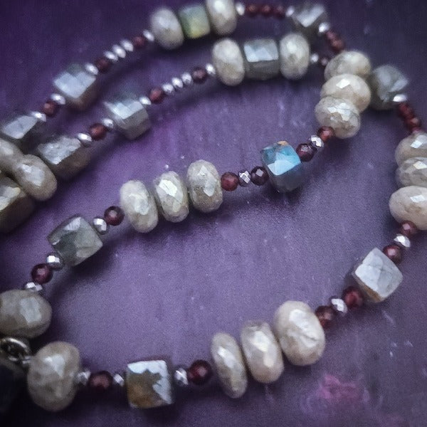 Rich Moonstone, Labradorite and Ruby glisten to give this piece a look of luxury, guaranteed to make your kitten purr with delight! An original, handcrafted one-of-a-kind kitten collar.