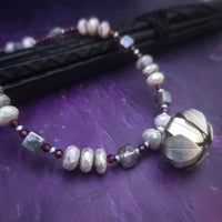 Rich Moonstone, Labradorite and Ruby glisten to give this piece a look of luxury, guaranteed to make your kitten purr with delight! An original, handcrafted one-of-a-kind kitten collar.