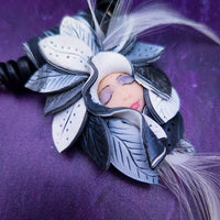 FOREST FAIRIES are ONE OF A KIND Artisan Necklaces. A sweet little fairy is caught napping in her nest of leaves. Each is a one of a kind piece of wearable art with her own unique look and personality. The faces are hand-painted and then surrounded by hand-cut leaves and collected beads, gemstones and sculpted treasures. By Studio Navarri