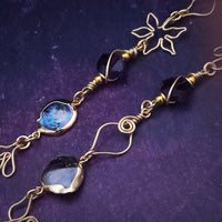 Feel empowered and beautiful wearing our exquisite Zasha Gemstone Collar, meticulously crafted with 14K gold-filled and stunning Amethyst gemstones. The hand-sculpted wire details, reminiscent of delicate flower petals, make this piece truly one of a kind. With a touch of elegance and sophistication, this statement collar will turn heads. 