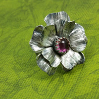 Take a journey to a summer cottage, gracefully adorned with climbing roses, clematis and wisteria. Invoke a feeling of warmth and tranquility with this sterling silver and pink sapphire COTTAGE ROSE Ring.