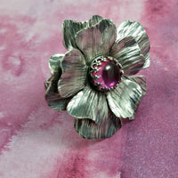 Take a journey to a summer cottage, gracefully adorned with climbing roses, clematis and wisteria. Invoke a feeling of warmth and tranquility with this sterling silver and pink sapphire COTTAGE ROSE Ring.