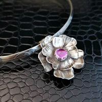 This stunning, handmade Rose of Aphrodite Pendant, crafted in sterling silver, symbolizes love and beauty, but also evokes enduring strength.