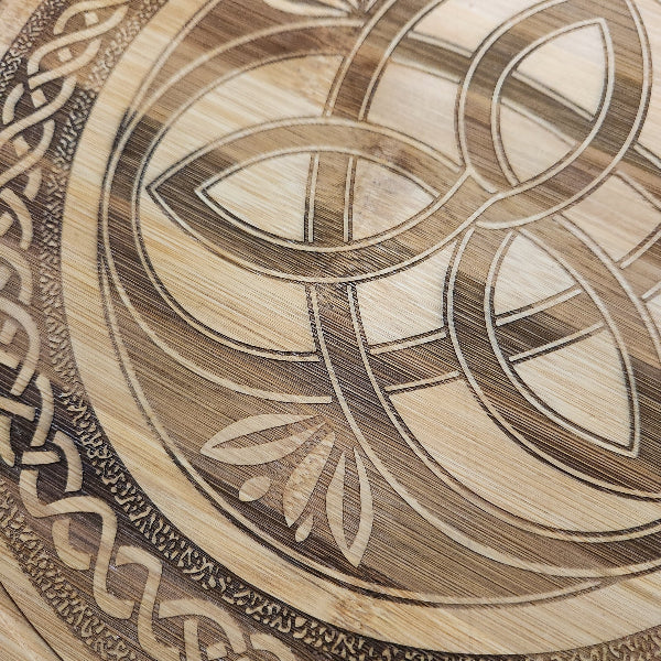 Wooden surface with intricate Celtic knot design