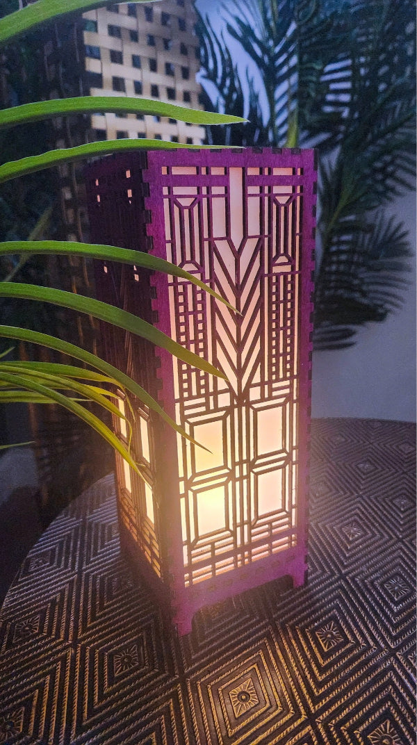 Decorative lamp with geometric pattern on a textured surface