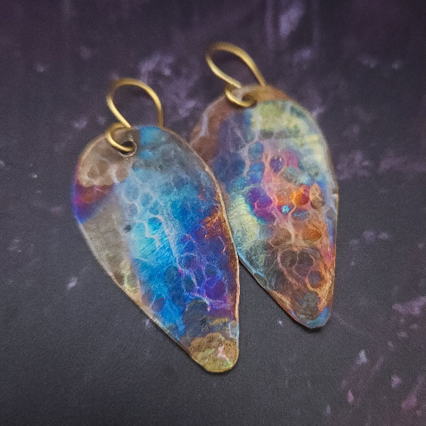Pair of hammered copper shield earrings with flame kissed patina, by Studio Navarri