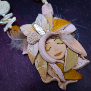 FOREST FAIRIES are ONE OF A KIND Artisan Necklaces. A sweet little fairy is caught napping in her nest of leaves. Each is a one of a kind piece of wearable art with her own unique look and personality. By Studio Navarri