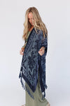 Everyone loves a great kimono- This elevated style features a dreamy velvet and mesh blend that will catch anyone's eye! The tassel details add extra movement for a fun and flirty look. Style with your favorite basics for an easy head to toe outfit!