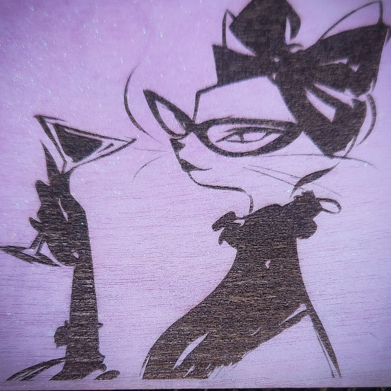 Stylized illustration of a cat-like character with a bow, holding a martini glass on a pink background.