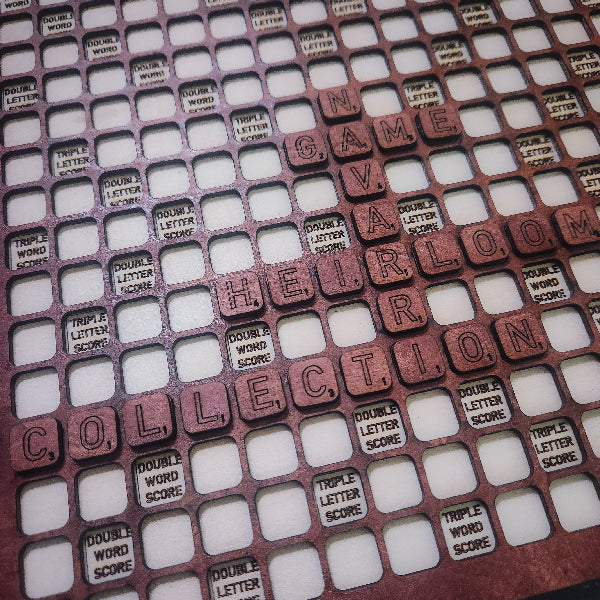 scrabble tile board with text 'Game Room Heirloom Collection' on a white background