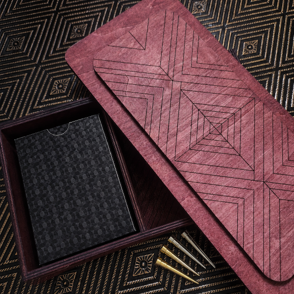 Teak stained cribbage game box, open to reveal a black cardholder and gold pen.