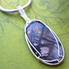 Wire Wrapping Jewelry Classe. Learn the skills to make beautiful wire wrapped pendants using a few hand tools, jewelry wire and a focal bead or gemstone.  Studio Navarri in Knoxville