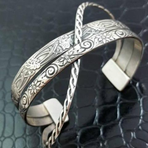 CROSSOVER CUFFS have three patterns of sterling silver, each gently crossing over and through the others to form a unique cuff bracelet. Perfect companion for our collars. THIS LISTING IS made with the Soft and Sweet, Wild Flower and Celtic Rope floral patterns.