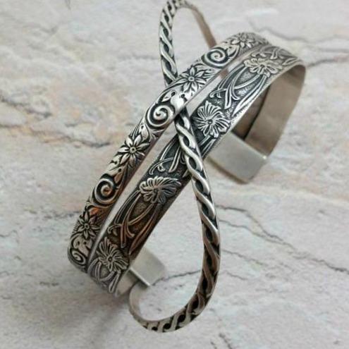 CROSSOVER CUFFS have three patterns of sterling silver, each gently crossing over and through the others to form a unique cuff bracelet. Perfect companion for our collars. THIS LISTING IS made with the Soft and Sweet, Wild Flower and Celtic Rope floral patterns.