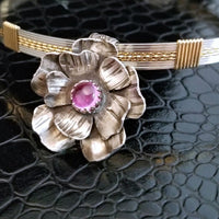 This stunning, handmade Rose of Aphrodite Pendant, crafted in sterling silver, symbolizes love and beauty, but also evokes enduring strength.