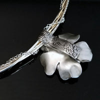 This stunning, handmade Rose of Aphrodite Pendant, crafted in sterling silver, symbolizes love and beauty, but also evokes enduring strength.