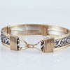 The ‘ZUZY’ collection, hand crafted in a flirty floral pattern of sterling silver and wire wrapped with gold accents.