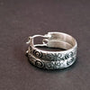 Wild Flower Hoop Earrings in sterling silver with handcrafted ear wires. Measures approx. 1 inch in diameter